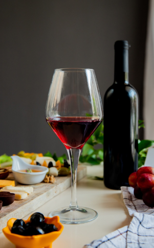 red wine glass & bottle